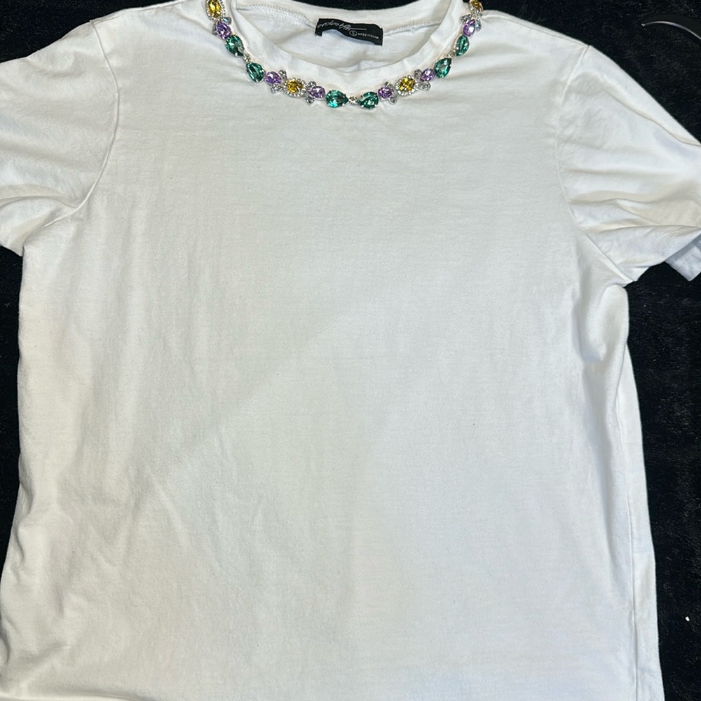 White top with rhinestone on the neck